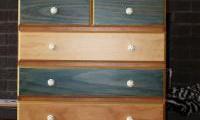 Originally bare timber stained and varnished