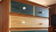 Originally bare timber stained and varnished