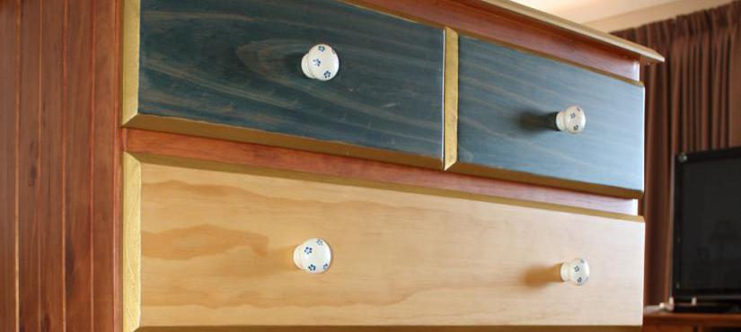 Originally bare timber stained and varnished